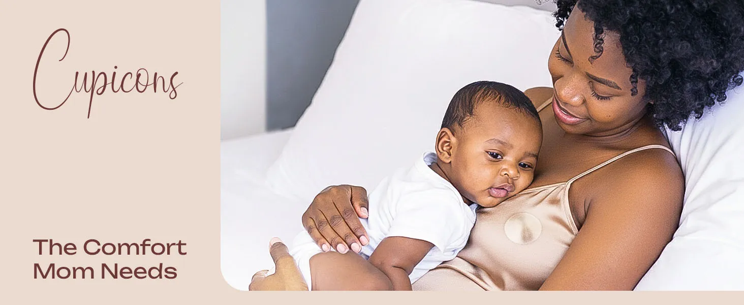 mother with baby on her chest and nipple sheild on her breast